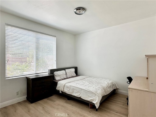 bedroom featuring light hardwood / wood-style floors