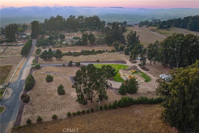 aerial view at dusk with a rural view