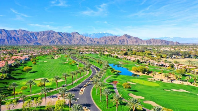 view of property's community featuring a water and mountain view