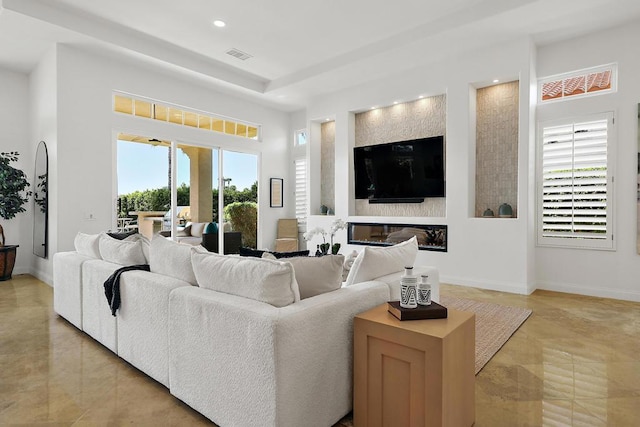 living room with plenty of natural light