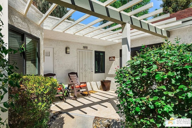 view of patio / terrace featuring a pergola