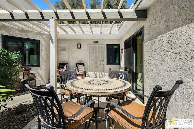 view of patio featuring a pergola