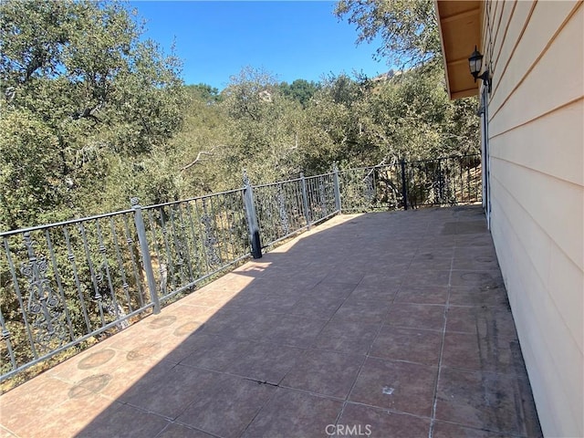 view of patio with a balcony