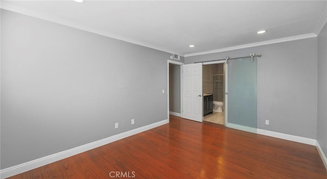 333 Burchett St Unit 308, Glendale, CA 91203 - unfurnished bedroom featuring recessed lighting, crown molding, wood finished floors, and connected bathroom