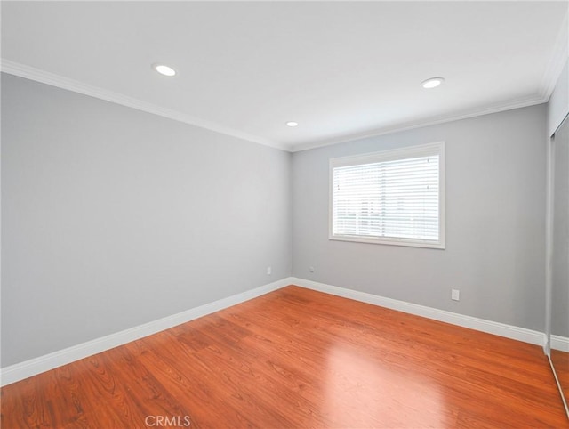 333 Burchett St Unit 308, Glendale, CA 91203 - spare room with wood finished floors, crown molding, and recessed lighting