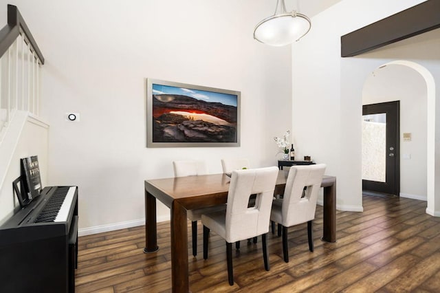 dining area featuring dark hardwood / wood-style flooring