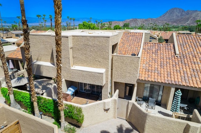 exterior space featuring a mountain view