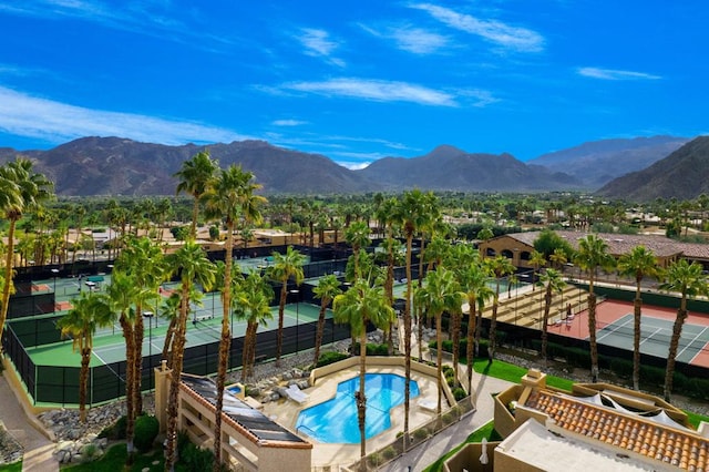 view of swimming pool featuring a mountain view