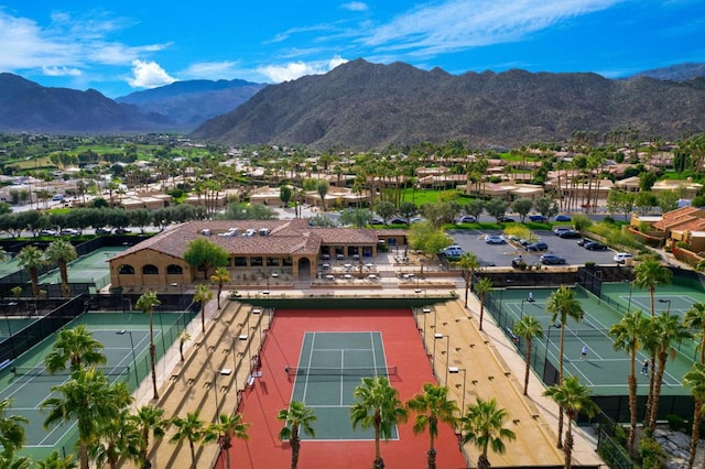 birds eye view of property featuring a mountain view