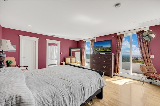 bedroom with light wood-type flooring