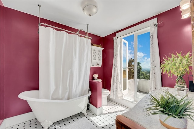 full bathroom with shower with separate bathtub, vanity, tile patterned flooring, and toilet