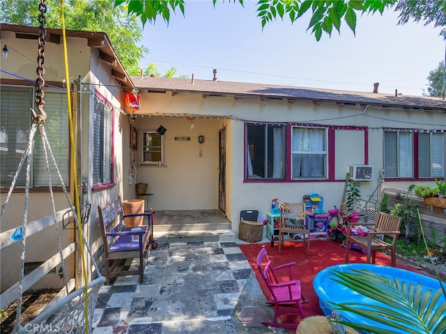 rear view of house with a patio area