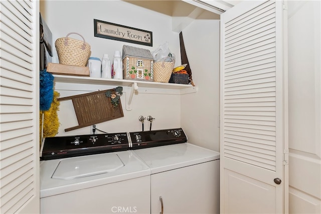 laundry room featuring washing machine and clothes dryer