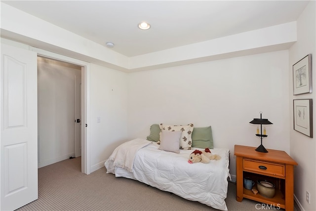 bedroom with light carpet