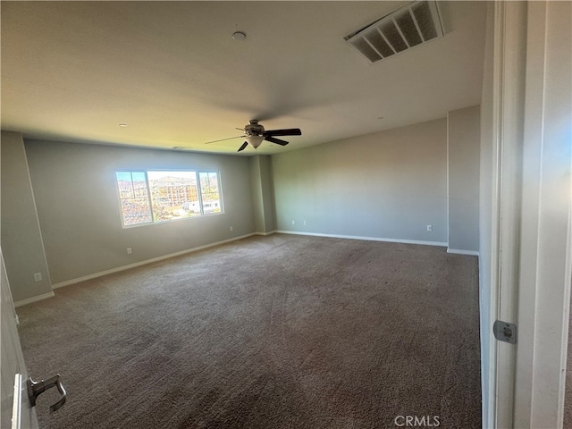 carpeted empty room with ceiling fan