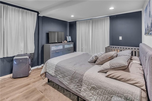 bedroom featuring light hardwood / wood-style flooring