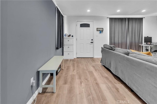 living room with light hardwood / wood-style flooring