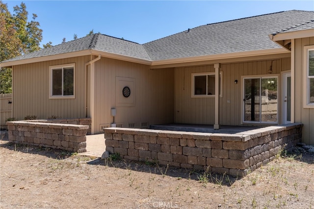 rear view of house featuring a patio