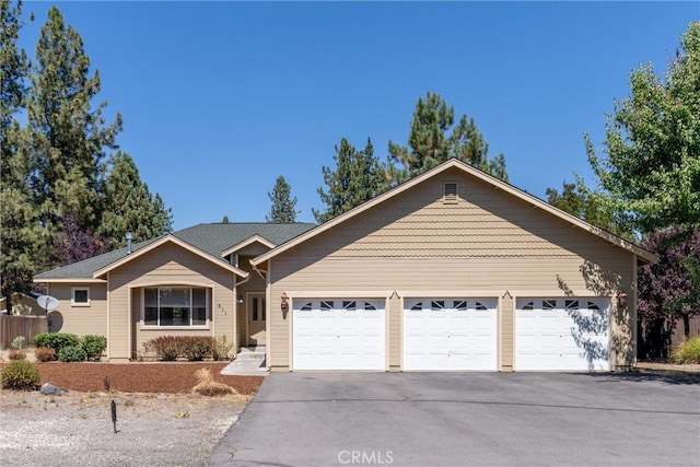 ranch-style home with a garage