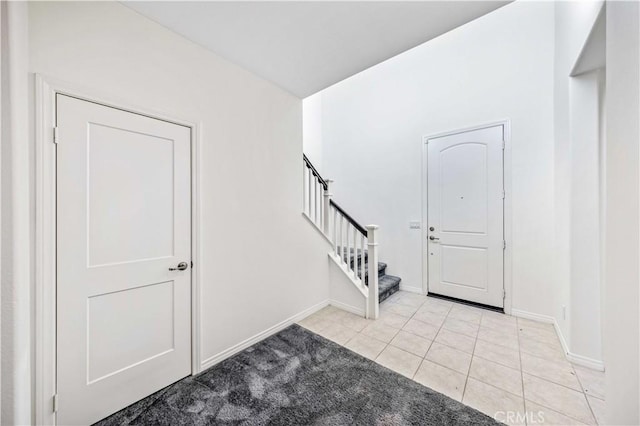 view of tiled foyer entrance