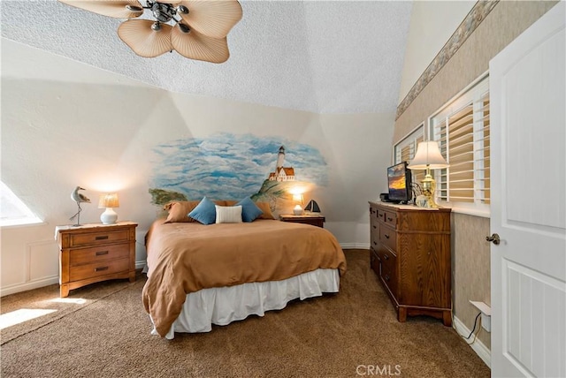 bedroom with carpet flooring, a textured ceiling, ceiling fan, and lofted ceiling