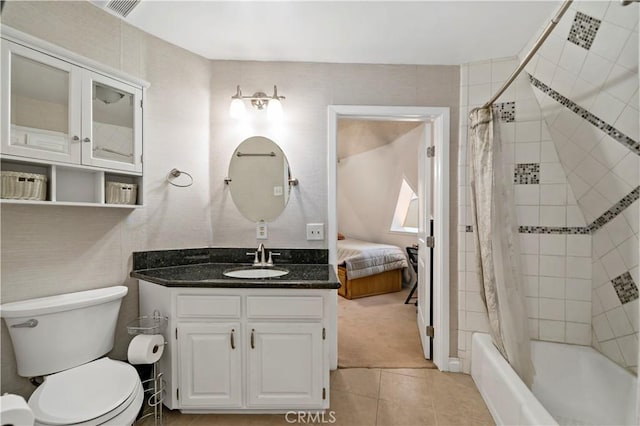 full bathroom with tile patterned floors, vanity, toilet, and shower / tub combo