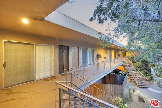 exterior space featuring a wall unit AC