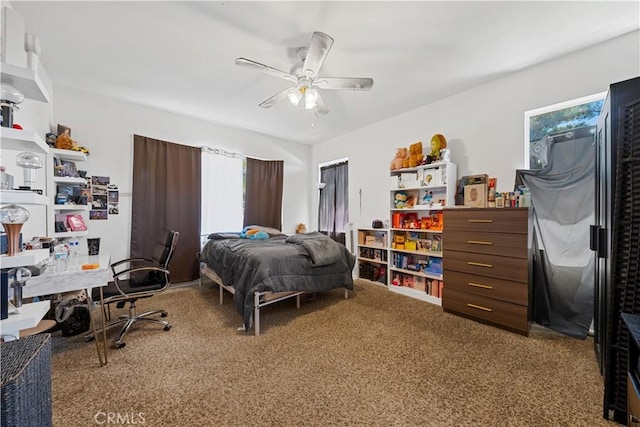 bedroom featuring carpet flooring and ceiling fan