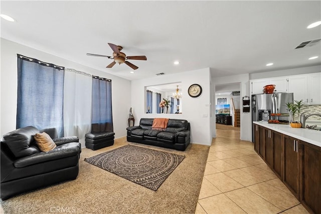 11819 La Costa Ct, Yucaipa, CA 92399 - living room with ceiling fan, light tile patterned flooring, recessed lighting, and a chandelier