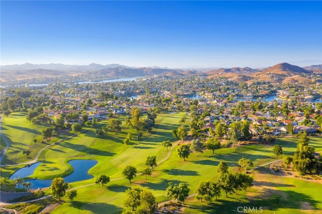 birds eye view of property featuring a water and mountain view