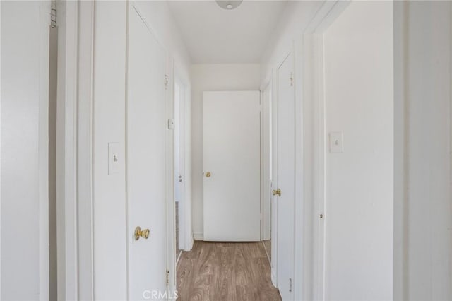 hallway featuring light wood-type flooring