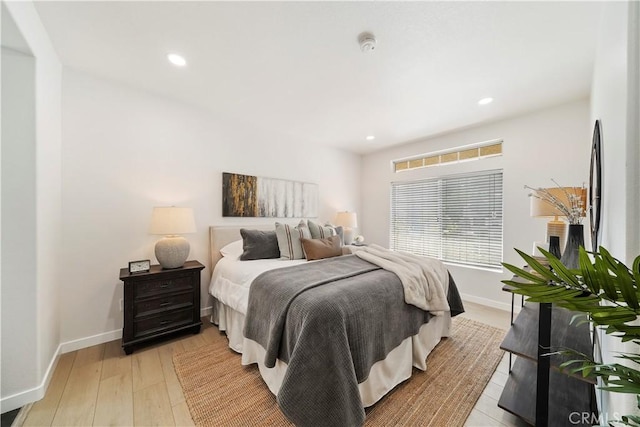 bedroom featuring light wood-type flooring