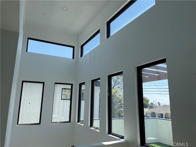 entryway featuring a high ceiling