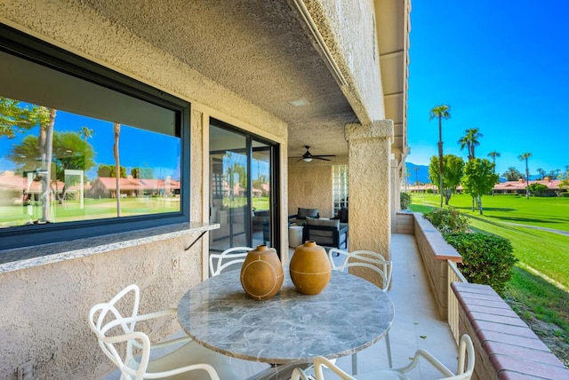 view of patio with ceiling fan