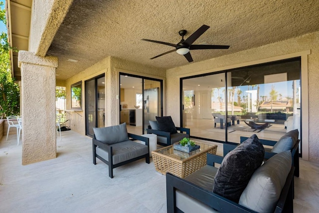 view of patio / terrace with ceiling fan and an outdoor hangout area