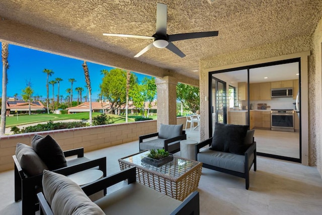 view of patio / terrace featuring an outdoor hangout area and ceiling fan