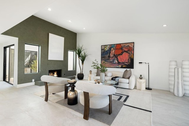 interior space with lofted ceiling and a fireplace