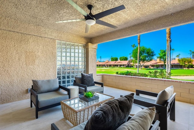 view of patio featuring an outdoor living space and ceiling fan