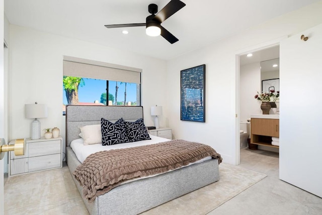 bedroom featuring connected bathroom and ceiling fan