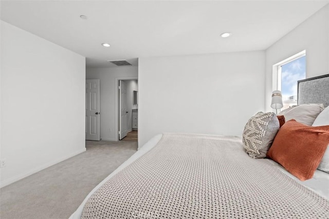 bedroom with recessed lighting, light colored carpet, visible vents, and baseboards