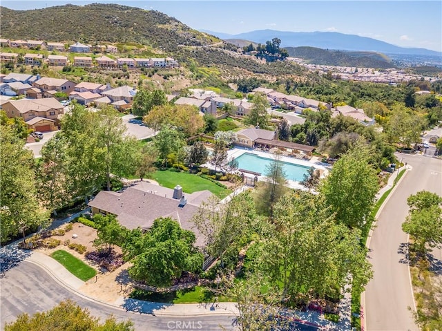 birds eye view of property featuring a mountain view