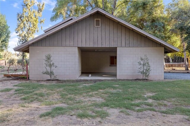 garage with a lawn