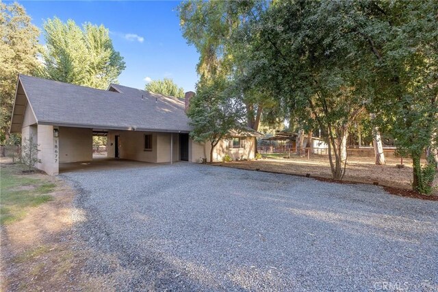 view of front of house with a carport