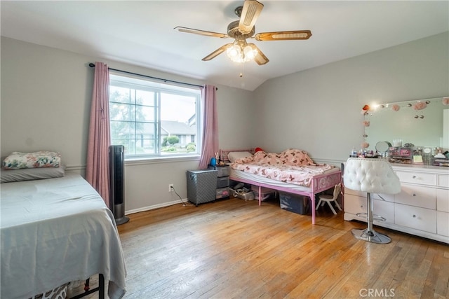 bedroom featuring light hardwood / wood-style flooring and ceiling fan