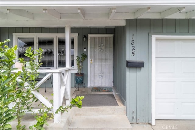 property entrance with a garage