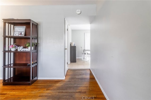 hallway featuring hardwood / wood-style floors