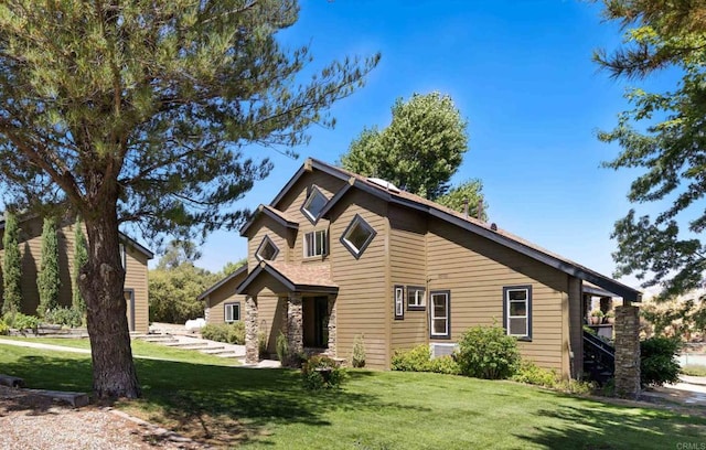 exterior space with a front yard