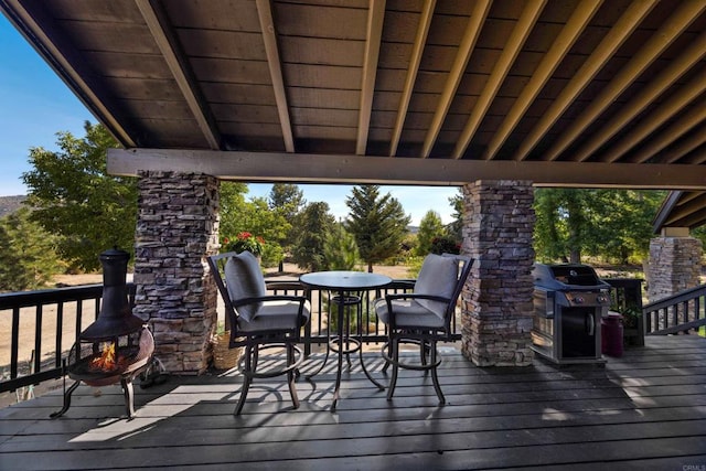 wooden deck with area for grilling