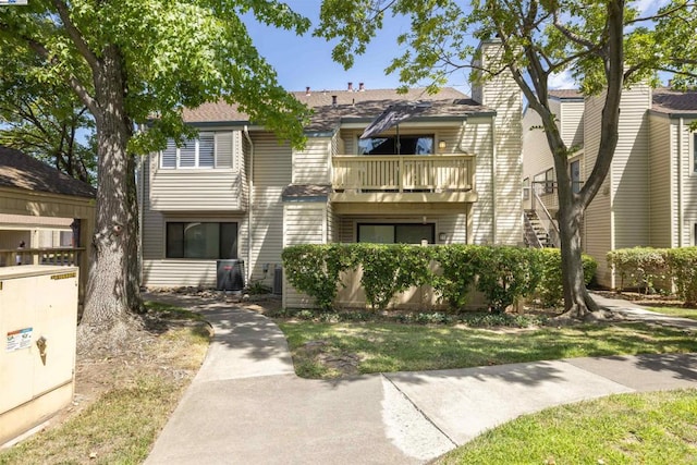 exterior space featuring a balcony and central AC