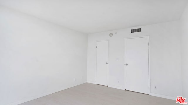 unfurnished bedroom featuring light hardwood / wood-style flooring